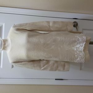 Ermanno long turtleneck sweater.